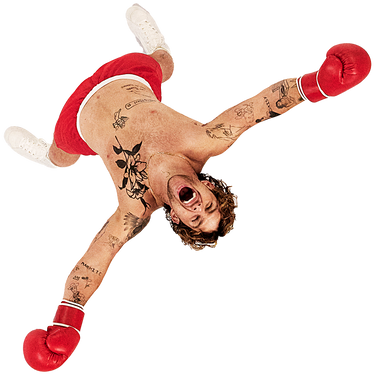 Tom Grennan in boxing gloves