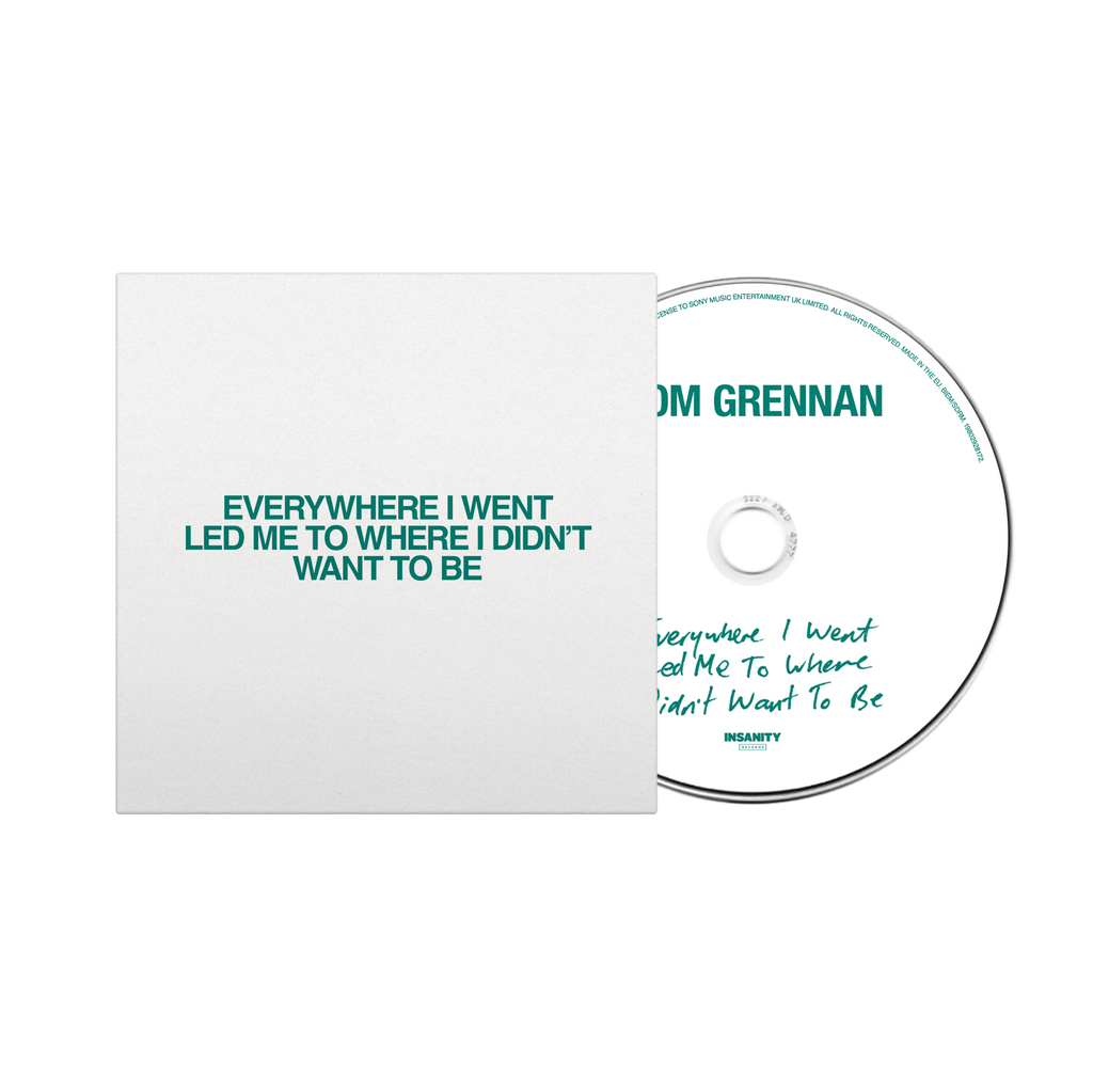 CD and cover with text 'Everywhere I Went Led Me To Where I Didn't Want To Be' by Tom Grennan on a white background